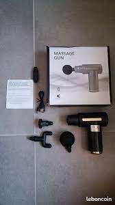 Pistolet de massage a la main